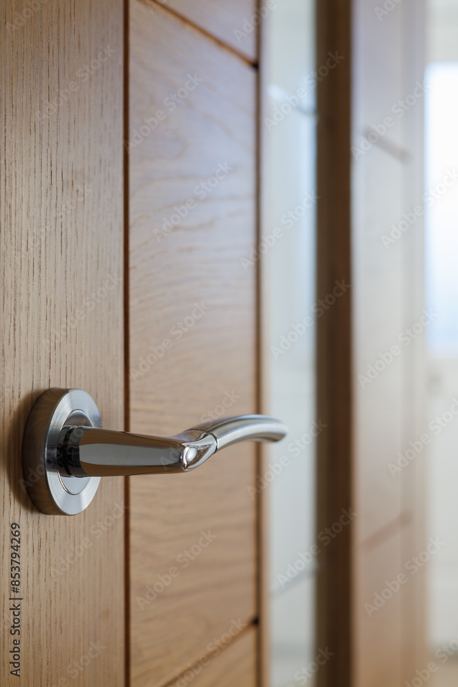 close up of door handle on wooden door close up of door handle on wooden door
