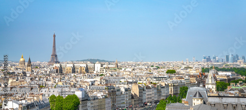 Fototapeta Naklejka Na Ścianę i Meble -  Paris street with view on the famous paris eiffel tower on a sunny day with some sunshine