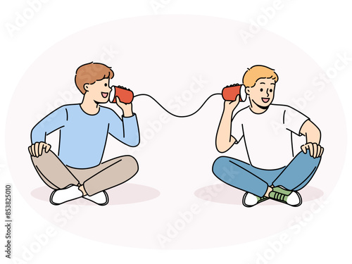 Smiling boys talk on tin can phone. Happy children have fun speak on handmade cups telephone. Childhood. Vector illustration.