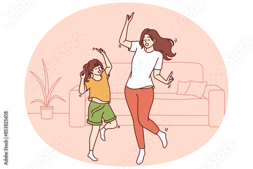 Active family of dancing young mother and daughter enjoying movement to music. Dance of teenage girl, elementary school student and mother or older sister dancing together spending free time
