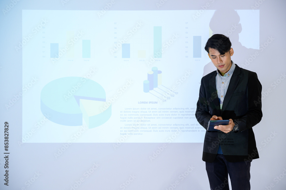 Business man gives presentation to colleagues during meeting, Shows Infographics Animation on Big Screen. Business man gives presentation to colleagues during meeting, Shows Infographics Animation on Big Screen.