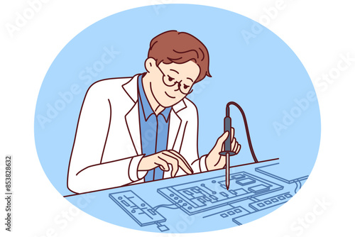 Man engineer uses soldering iron to repair computer board or invent new technology. Guy working as engineer in technology laboratory repairs electronic components from modern digital equipment