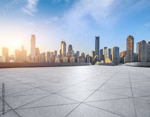 Empty square floors with modern city buildings scenery at sunrise in Chongqing