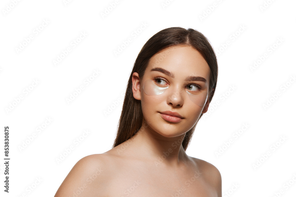 Portrait of beautiful young woman with healthy, spotless perfect skin using under eye patches for refreshing look, isolated on white background. Natural beauty, skincare, cosmetology, cosmetic concept Portrait of beautiful young woman with healthy, spotless perfect skin using under eye patches for refreshing look, isolated on white background. Natural beauty, skincare, cosmetology, cosmetic concept