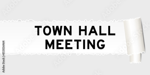 Ripped gray paper background that have word town hall meeting under torn part
