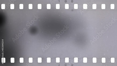 Damaged an old celluloid film strip with dust and scratches