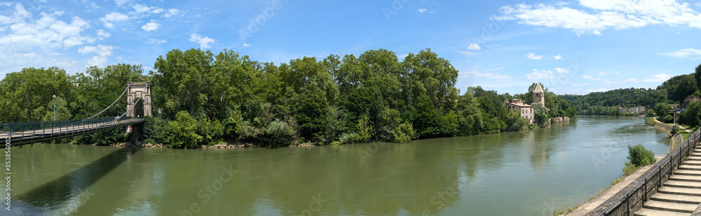 Panorama view of Barbe island on the Saone river, upstream, bridge and church, Lyon, France Panorama view of Barbe island on the Saone river, upstream, bridge and church, Lyon, France