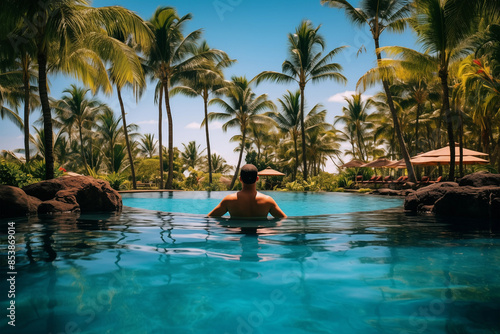 Back view of man swimming in water on tropical resort. Generative AI