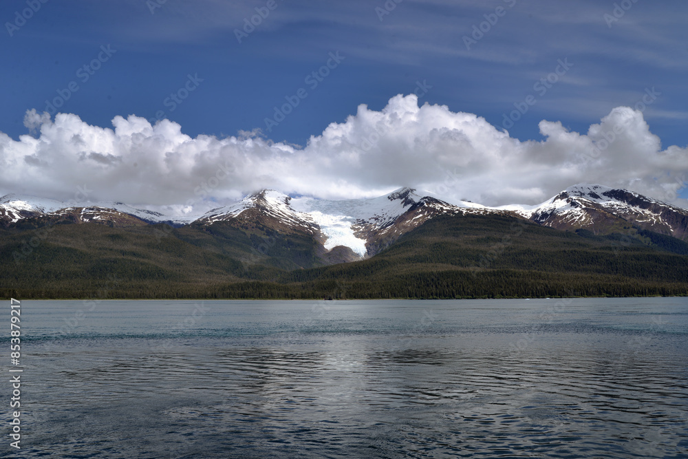 Mountain range with white clouds around Mountain range with white clouds around
