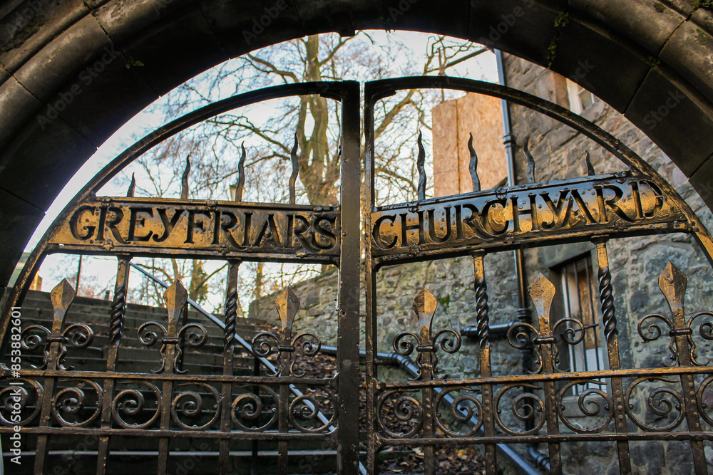 Edinburgh, Scotland. Entrance fence gate to Greyfriars Kirkyard, the graveyard surrounding Greyfriars Kirk at the southern edge of the Old Town