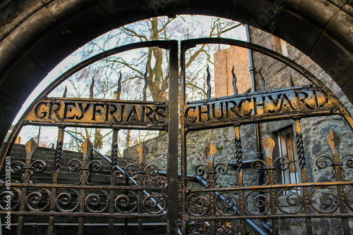 Obraz na płótnie Edinburgh, Scotland. Entrance fence gate to Greyfriars Kirkyard, the graveyard surrounding Greyfriars Kirk at the southern edge of the Old Town w salonie