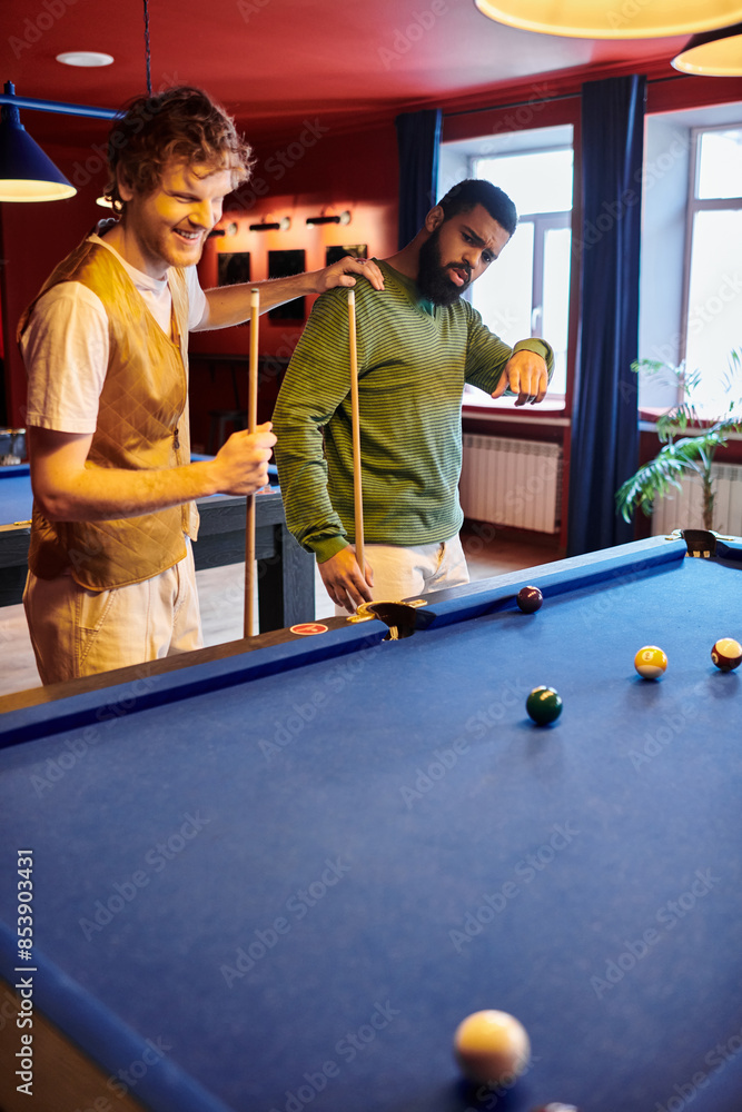 Fototapeta premium Friends play a friendly game of billiards in a casual setting.