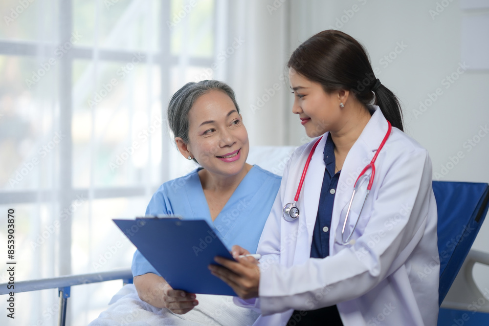 Doctor and patient discussing medical results in a modern healthcare setting. Trust and communication in a professional medical environment. Doctor and patient discussing medical results in a modern healthcare setting. Trust and communication in a professional medical environment.