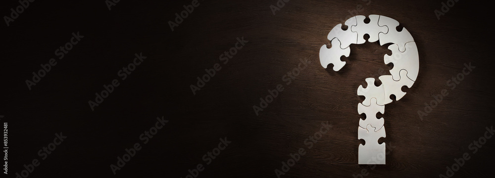 Puzzle question mark on dark wooden background, concept for assessments, test, exam, quiz, puzzle, knowledge checks backgrounds, concept of help, concept of solution. Puzzle question mark on dark wooden background, concept for assessments, test, exam, quiz, puzzle, knowledge checks backgrounds, concept of help, concept of solution.
