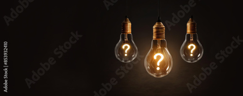 Hanging Question mark with light bulb concept, concept for assessments, test, exam, quiz, puzzle, knowledge checks backgrounds, concept of help, concept of solution.