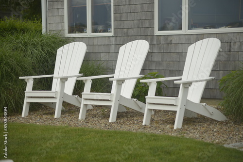 Three White Chairs