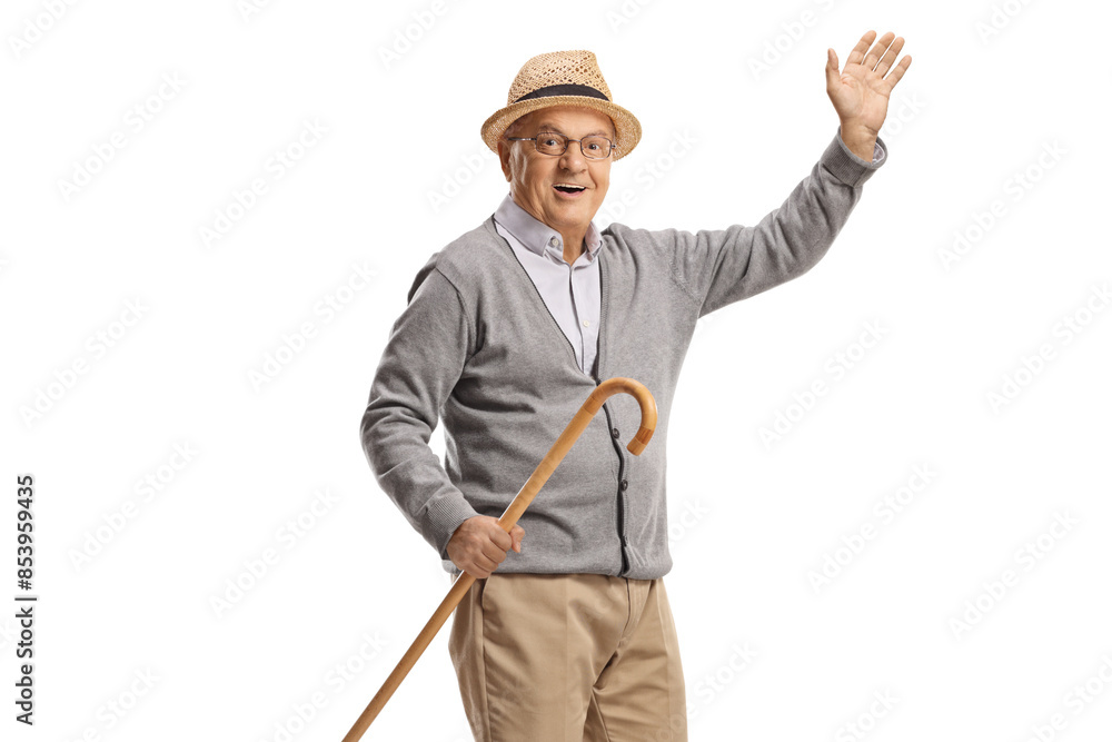 Elderly man holding a cane and waving Elderly man holding a cane and waving