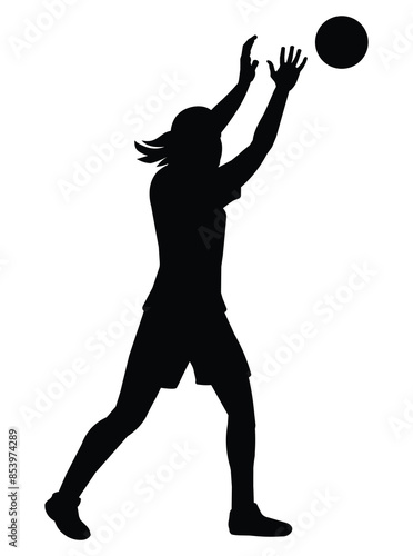 Black silhouette of a women's volleyball girl player who throws a ball with her arms raised high