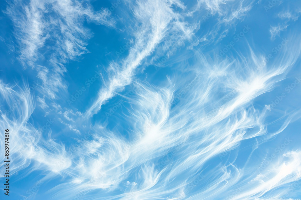 Beautiful blue sky during sunny day with subtle clouds Beautiful blue sky during sunny day with subtle clouds