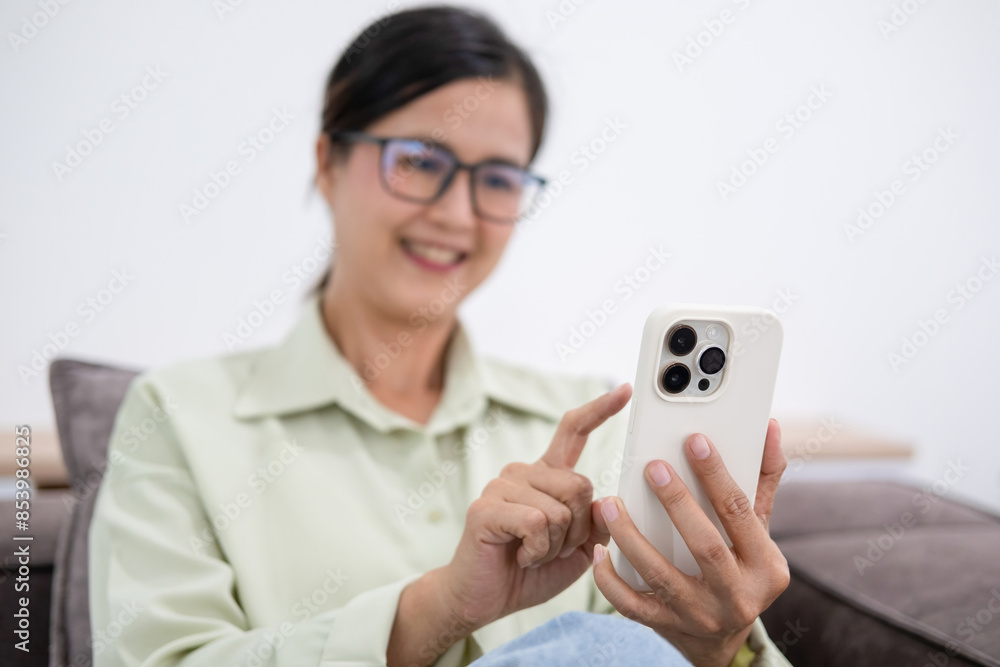 Woman embraces digital world from comfort of home. Woman embraces digital world from comfort of home.