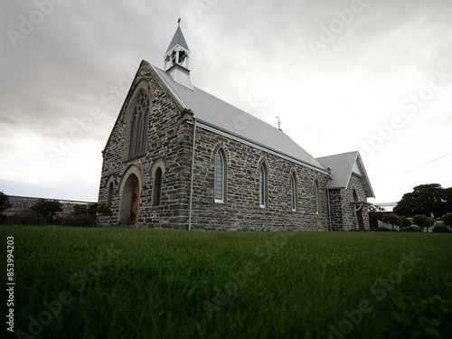 Low angle shot of former St John's Presbyterian church gothic architecture style building in Cromwell Otago New Zealand