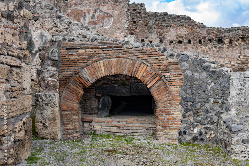Ruins of an ancient bakery pizzeria in the ancient city of Pompeii. Ruins of an ancient bakery pizzeria in the ancient city of Pompeii.