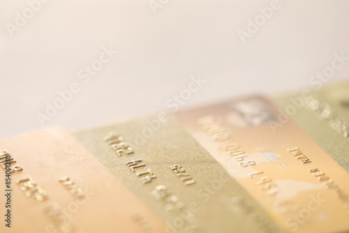 Many credit cards on gray background, closeup. Space for text