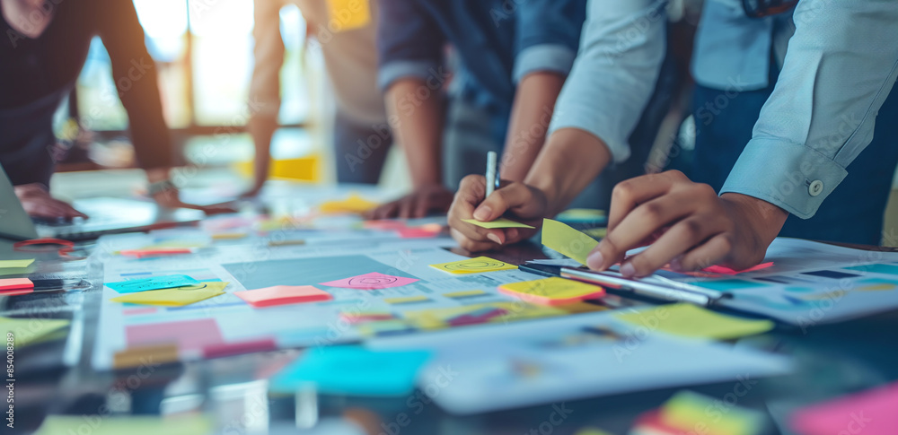 Obraz premium Team Collaboration with Sticky Notes and Papers 