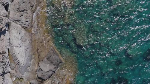 Mediterranean rock beach coastline marketing aerial shot