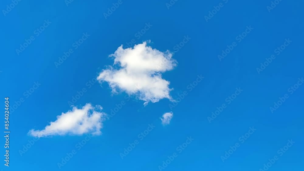 Blue sky white clouds, Landscape white clouds 4K. clouds pass in front of fixed camera, Summer blue sky time lapse, Nature weather blue sky, White clouds background. Blue sky white clouds, Landscape white clouds 4K. clouds pass in front of fixed camera, Summer blue sky time lapse, Nature weather blue sky, White clouds background.