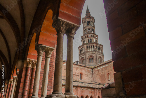 Bell Tower of Chiaravalle Abbey Viewed from the Cloister on a Cloudy Day