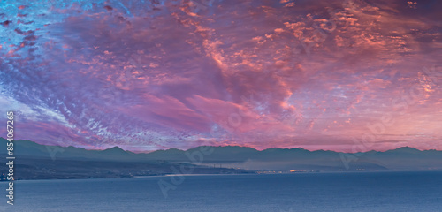 Sunrise over mountains and the Red Sea