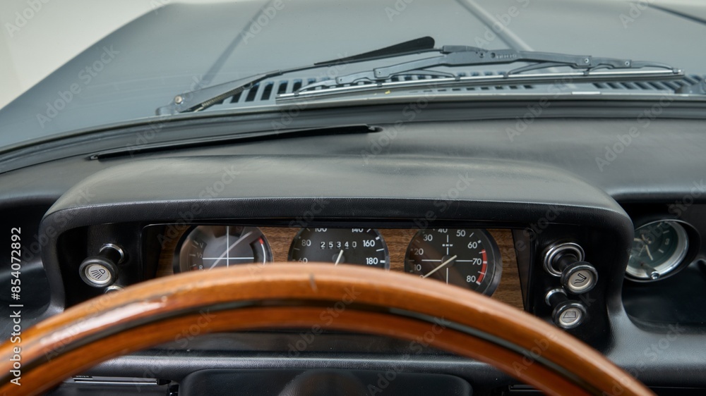 Wooden steering wheel in a car Wooden steering wheel in a car