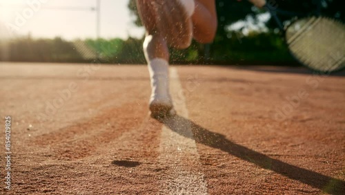 Woman Tennis Sliding and Hitting a ball