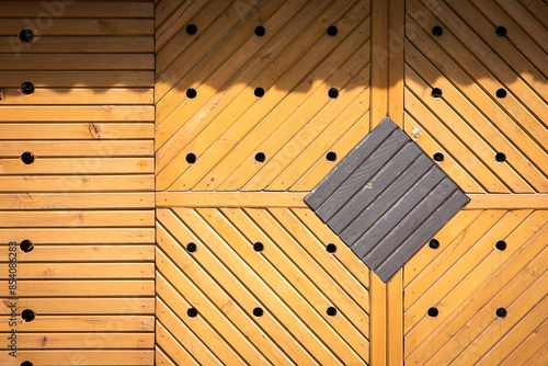 Wooden plank wall, design element for houses in rural environment