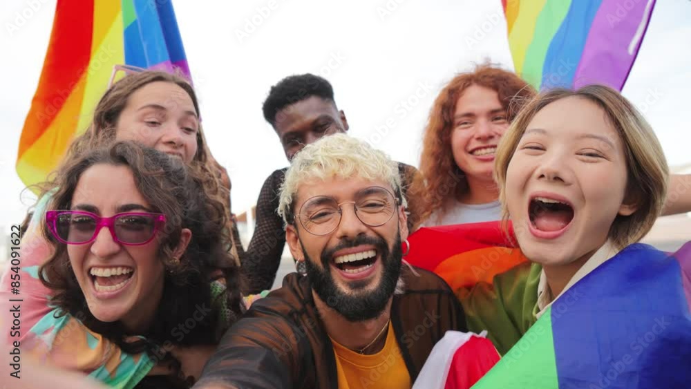 Selfie portrait of a group of lgbt mixed friends celebrating the gay pride parade with the rainbow flag. Multiracial lgtbi people having fun, smiling and looking at camera. Respect the sexuality Selfie portrait of a group of lgbt mixed friends celebrating the gay pride parade with the rainbow flag. Multiracial lgtbi people having fun, smiling and looking at camera. Respect the sexuality