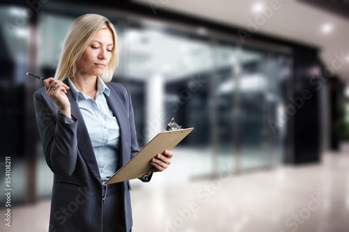 Mature busy businesswoman manager hold clipboard Free Download Mature busy businesswoman manager hold clipboard - GFXLoad