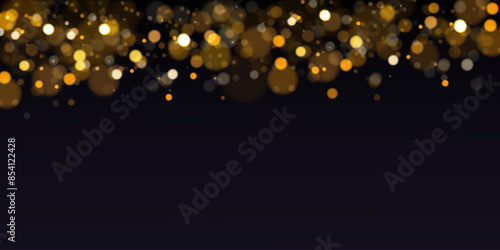 Abstract gold glitter bokeh with black background