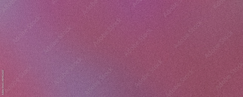 Fototapeta premium Grainy texture gradient background fading from purple to pink