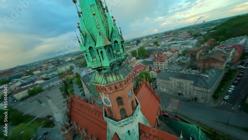 Agile flight around St. Joseph's Church and over Podgorski Square in Cracow photo