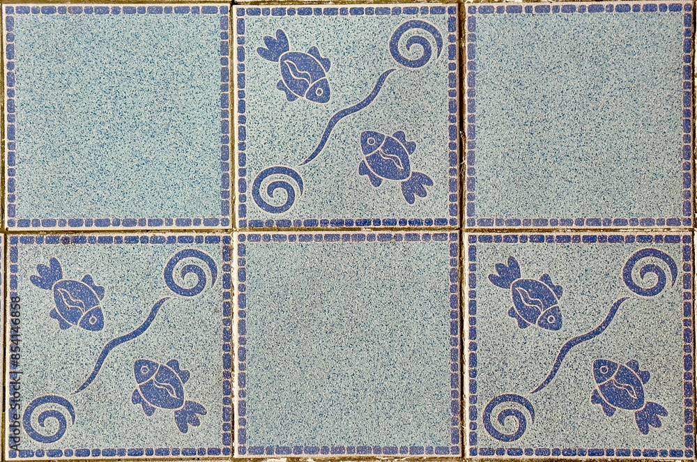 Blue shade square block ceramic pattern texture with the image of fishes Blue shade square block ceramic pattern texture with the image of fishes