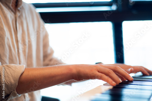 Music school. Playing the piano. Hands on keyboard