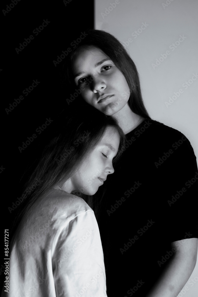 Black and white photo of sisters Black and white photo of sisters
