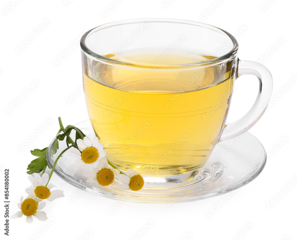 Aromatic herbal tea in glass cup and chamomiles isolated on white Aromatic herbal tea in glass cup and chamomiles isolated on white