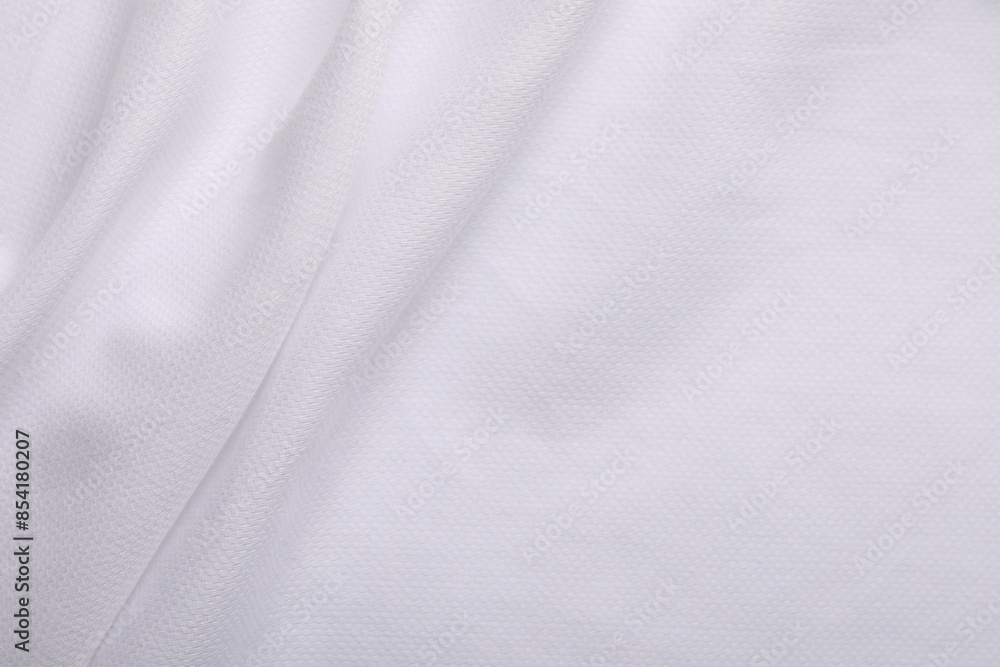 Fototapeta premium Texture of white fabric as background, top view