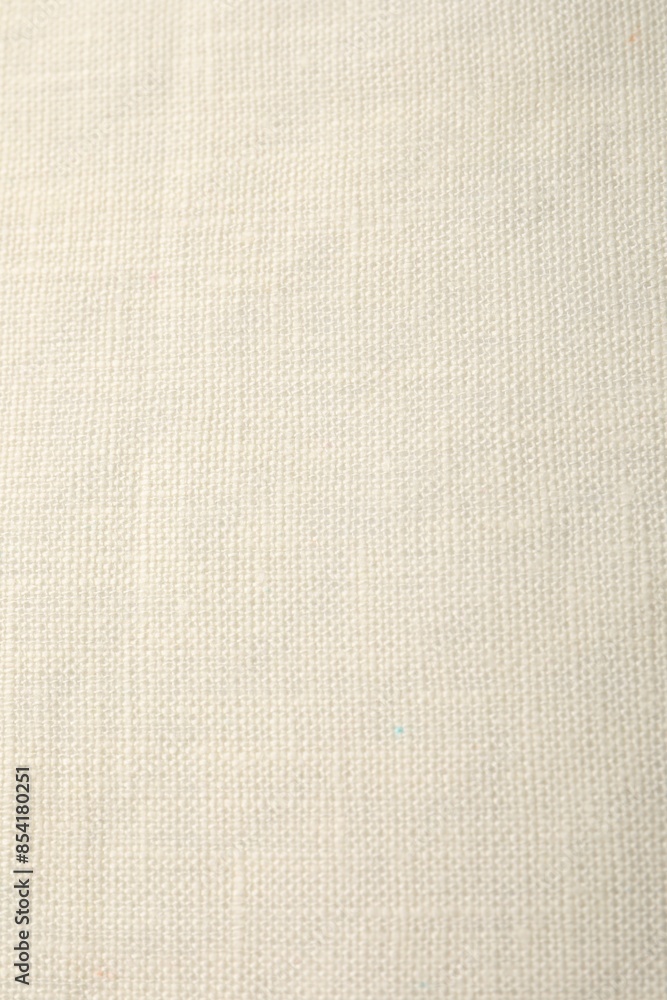Texture of pale yellow fabric as background, top view Texture of pale yellow fabric as background, top view