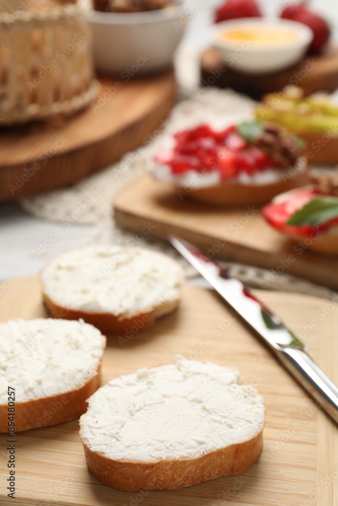 Delicious bruschettas with ricotta cheese on table, closeup Delicious bruschettas with ricotta cheese on table, closeup