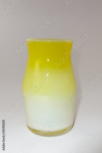 yellow glass vase isolated on white background