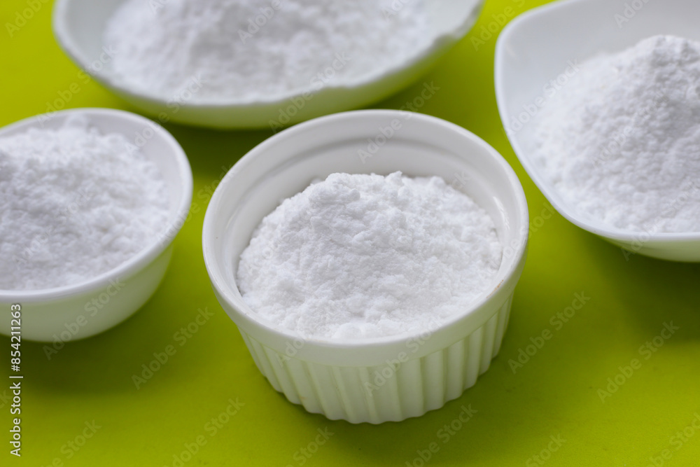 Bowl of baking soda, Sodium bicarbonate powder Bowl of baking soda, Sodium bicarbonate powder