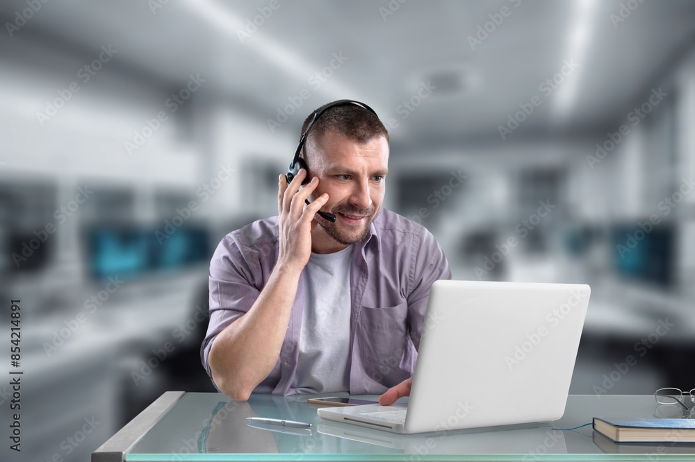 Young Software Developer work on laptop in office Young Software Developer work on laptop in office